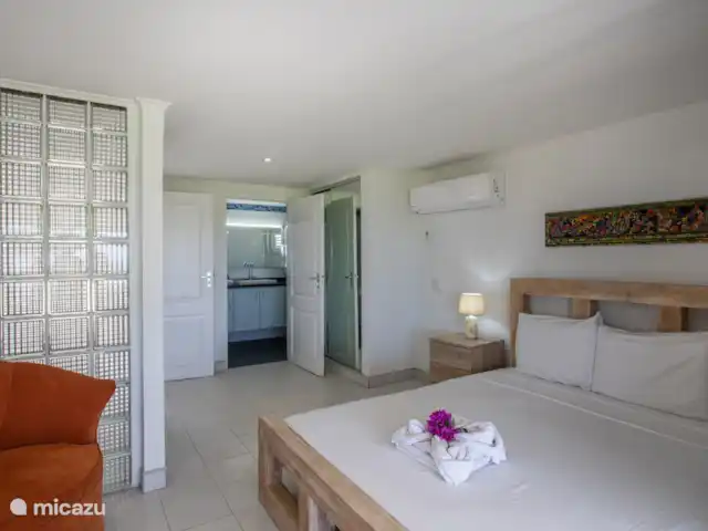 Station balnéaire de la baie de Piscadera 39 | Curaçao, Curaçao-Centre, Piscadera - bungalow Salon avec air conditionné