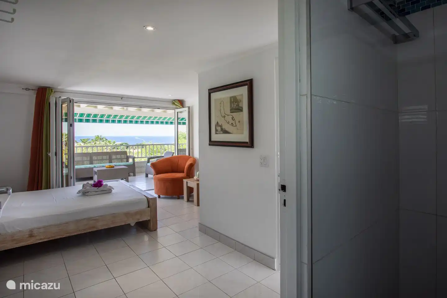 Master bedroom with ensuite bathroom and sea view