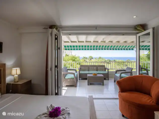 Station balnéaire de la baie de Piscadera 39 | Curaçao, Curaçao-Centre, Piscadera - bungalow Grande véranda avec vue mer