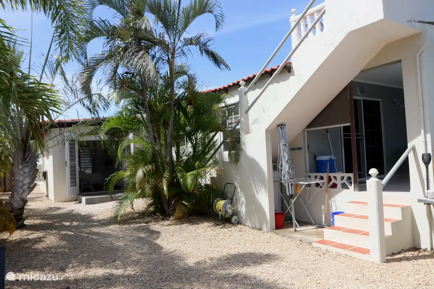 The Mica garden room with the staircase to the upper terrace with always a refreshing breeze from the Santa Barbara hill