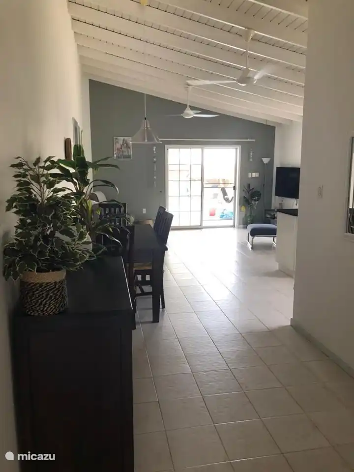 Living room with fans. Air conditioning available