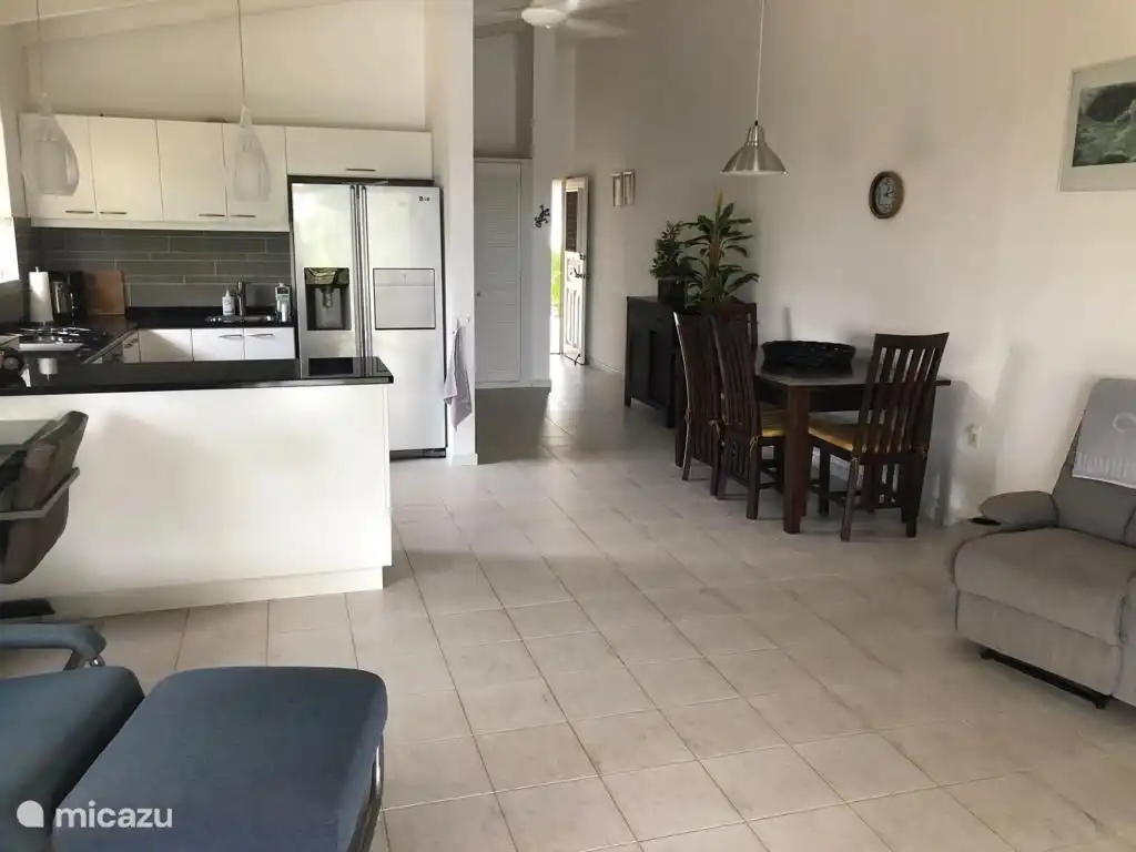 The kitchen with hob, coffee maker, sandwich maker, large fridge/freezer with ice maker, microwave and extensive crockery, etc. Safe in cupboard.