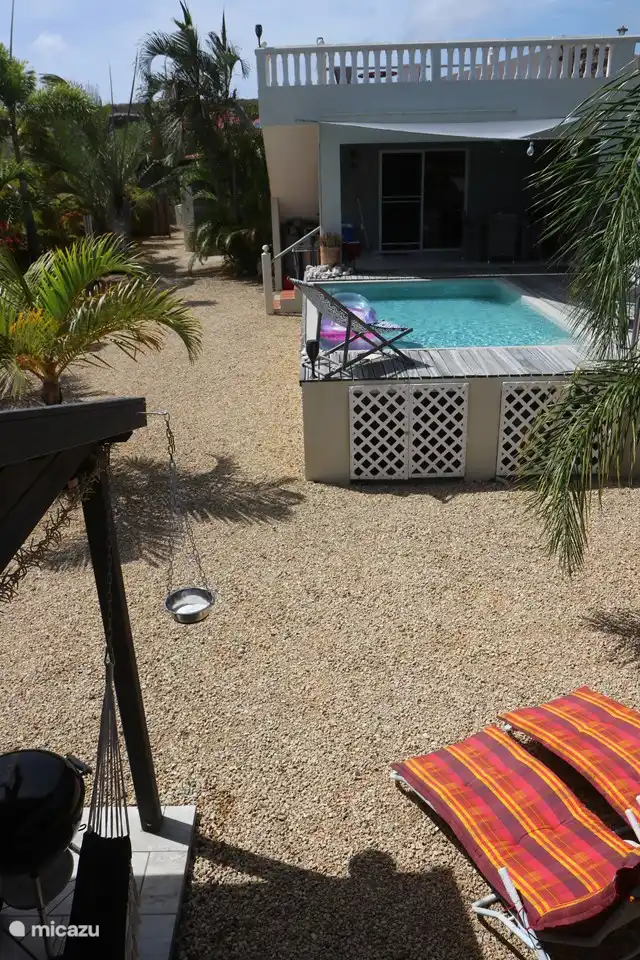 Garden, house, upper terrace and pool view