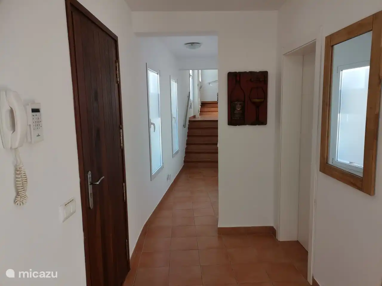 The entrance with the hall where the 3 bedrooms with bathrooms are located.