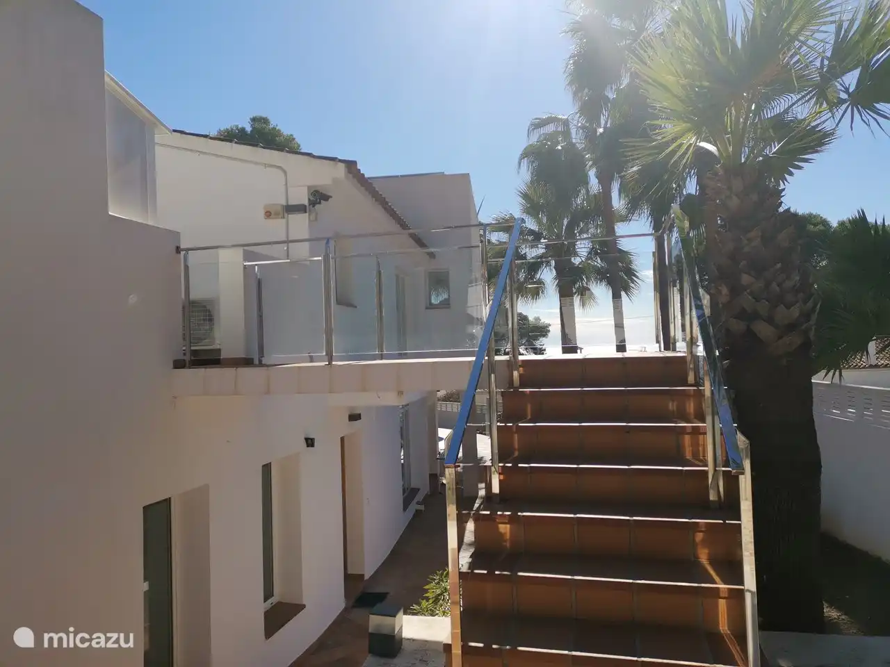 The side of the villa. This staircase leads you to the upper floor, which is closed for private use, but you can use the terrace from where you have an even better sea view!