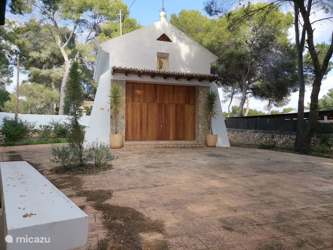 this cute little church is located behind the villa. It is no longer used as a church. I think it is now a summer residence!