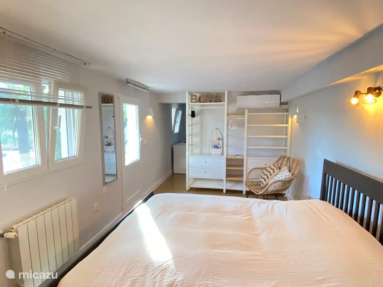 Downstairs bedroom. The bedroom can be reached from the outside