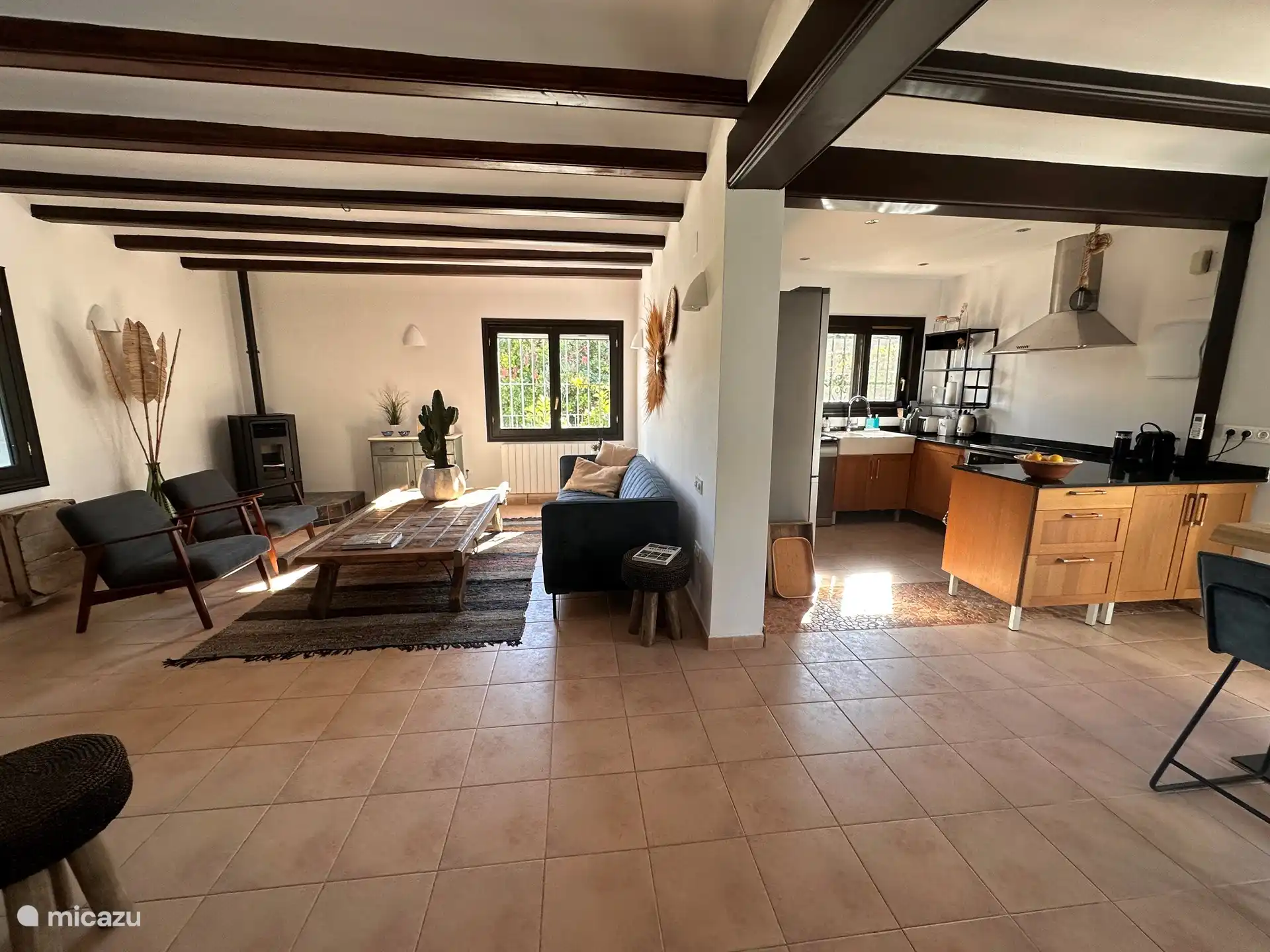 Living room with a view of the open kitchen
