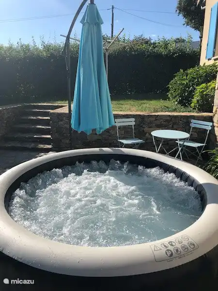 To spoil our guests extra, we opted for a super facility on our South Terrace. How about a blissful warm water massage with 170 jet bubbles… in complete privacy? An adapted parasol is also provided to complete the comfort. You have to take care of the drink yourself - ;)