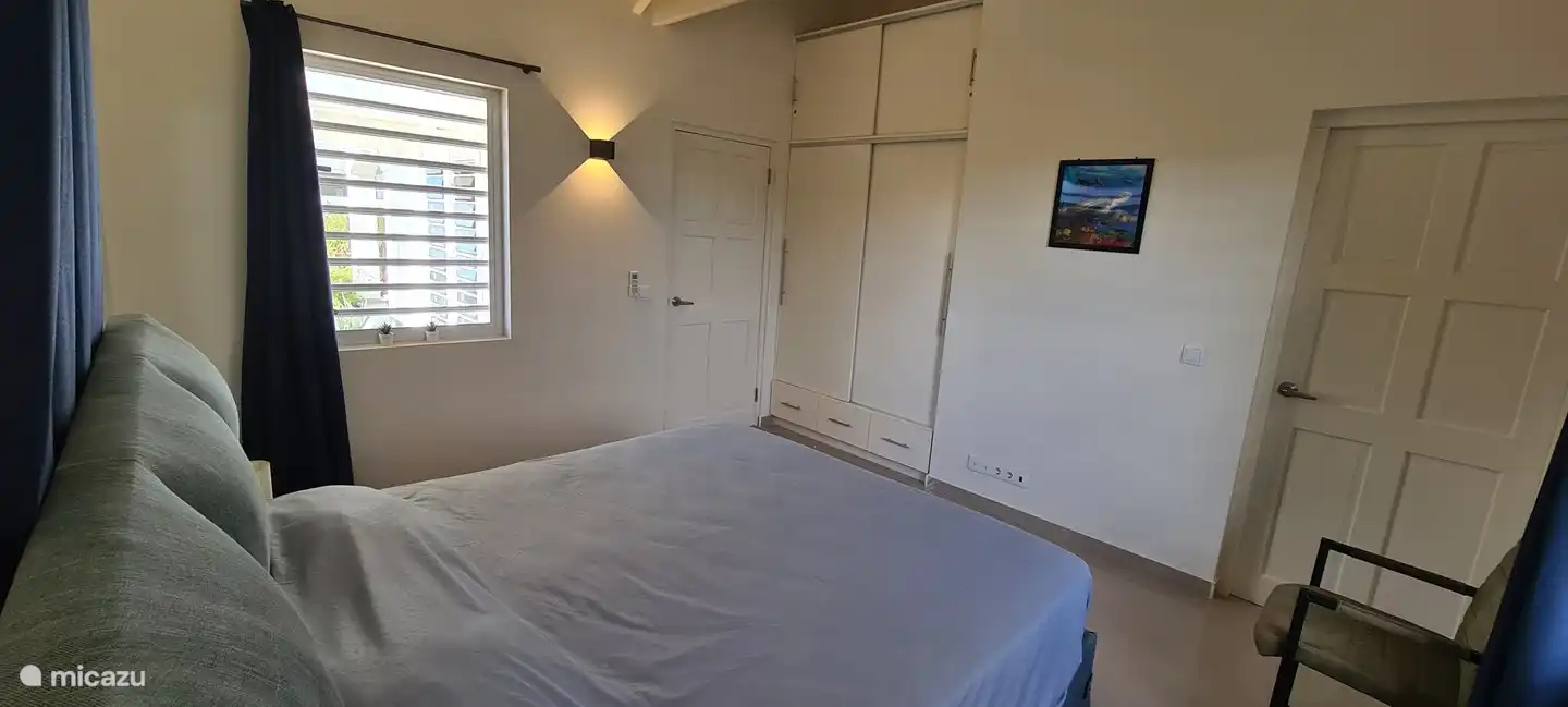 Master bedroom with fitted wardrobe.