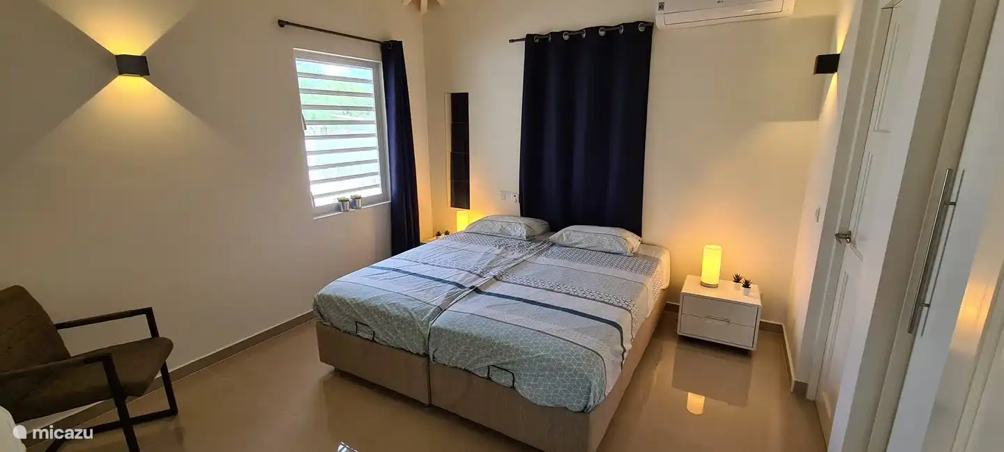 Bedroom 2 with private bathroom.