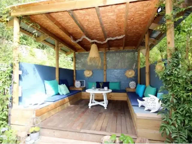 magia de la casa en España, Costa Blanca, Benissa - casa vacacional Acogedor asiento en la planta baja en el jardín, con vista al valle y al mar