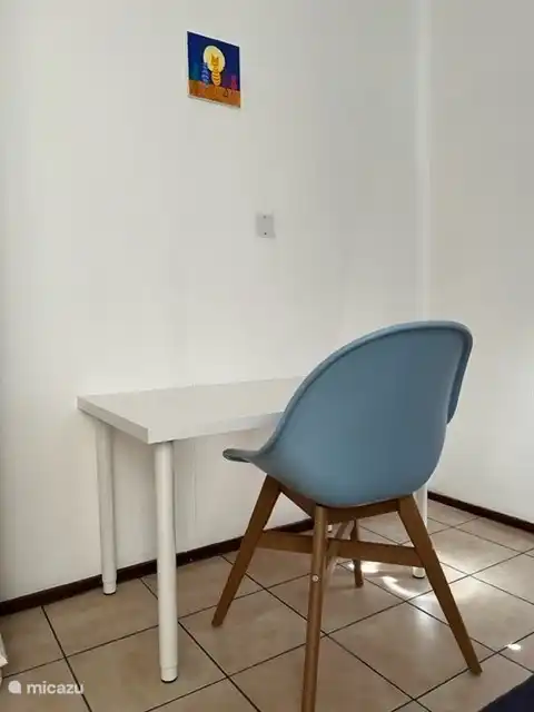 Desk with chair in the single bedroom