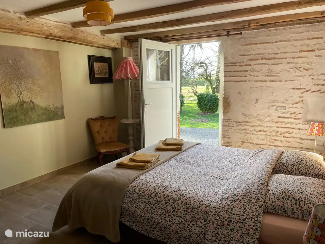 bedroom with extra exit and opening window