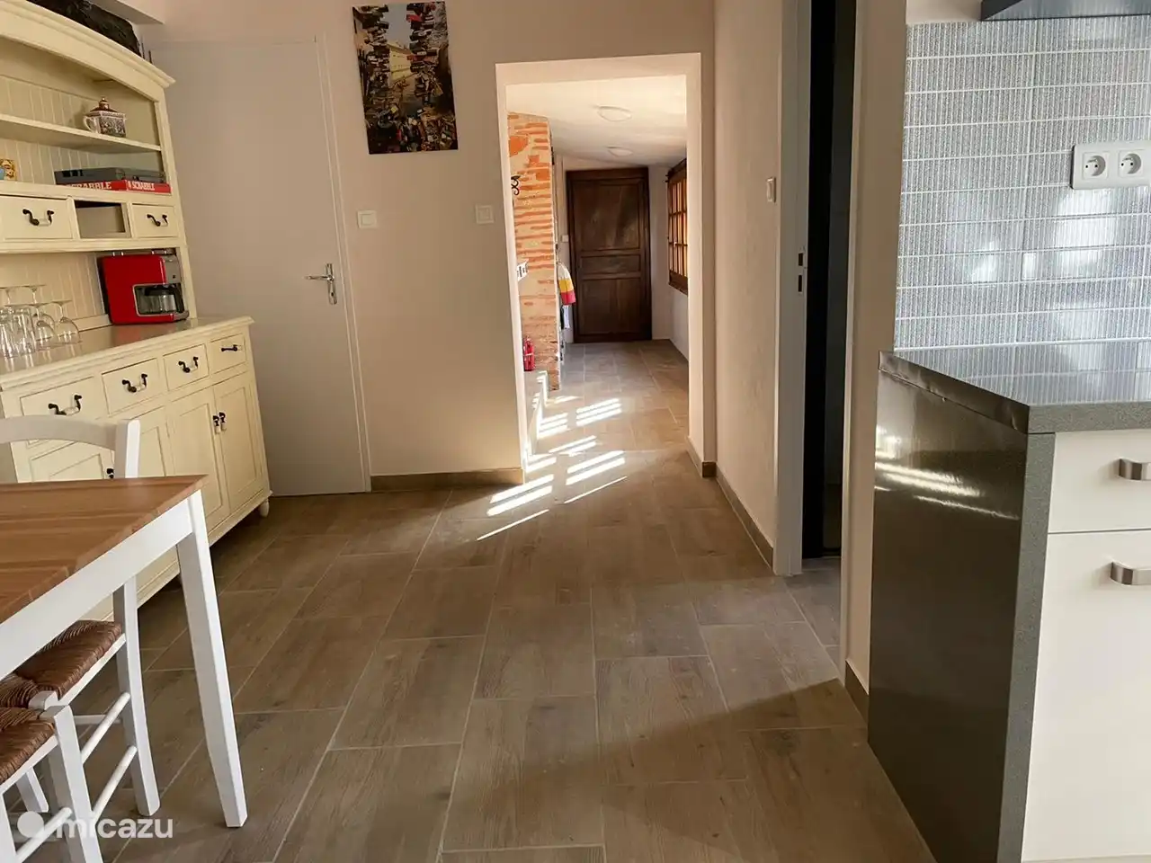 view of dining area and hallway