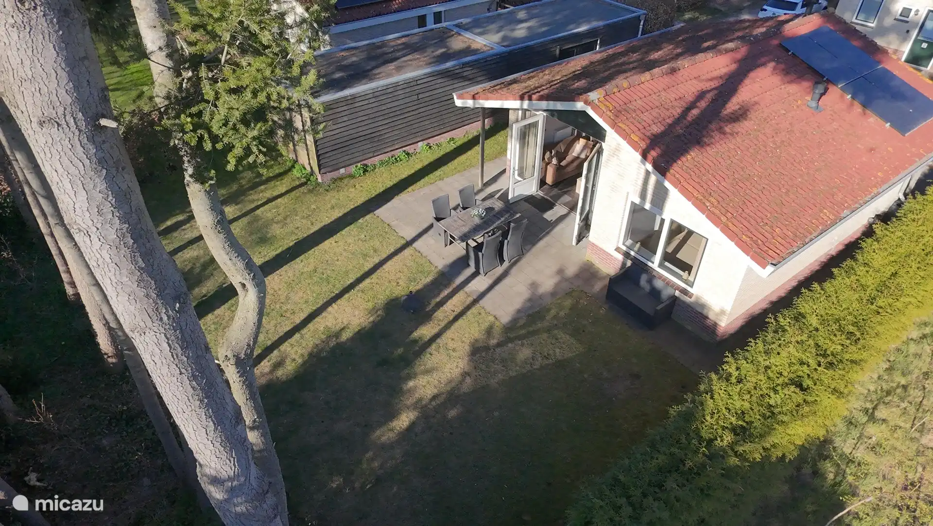 Top view of large garden and barn