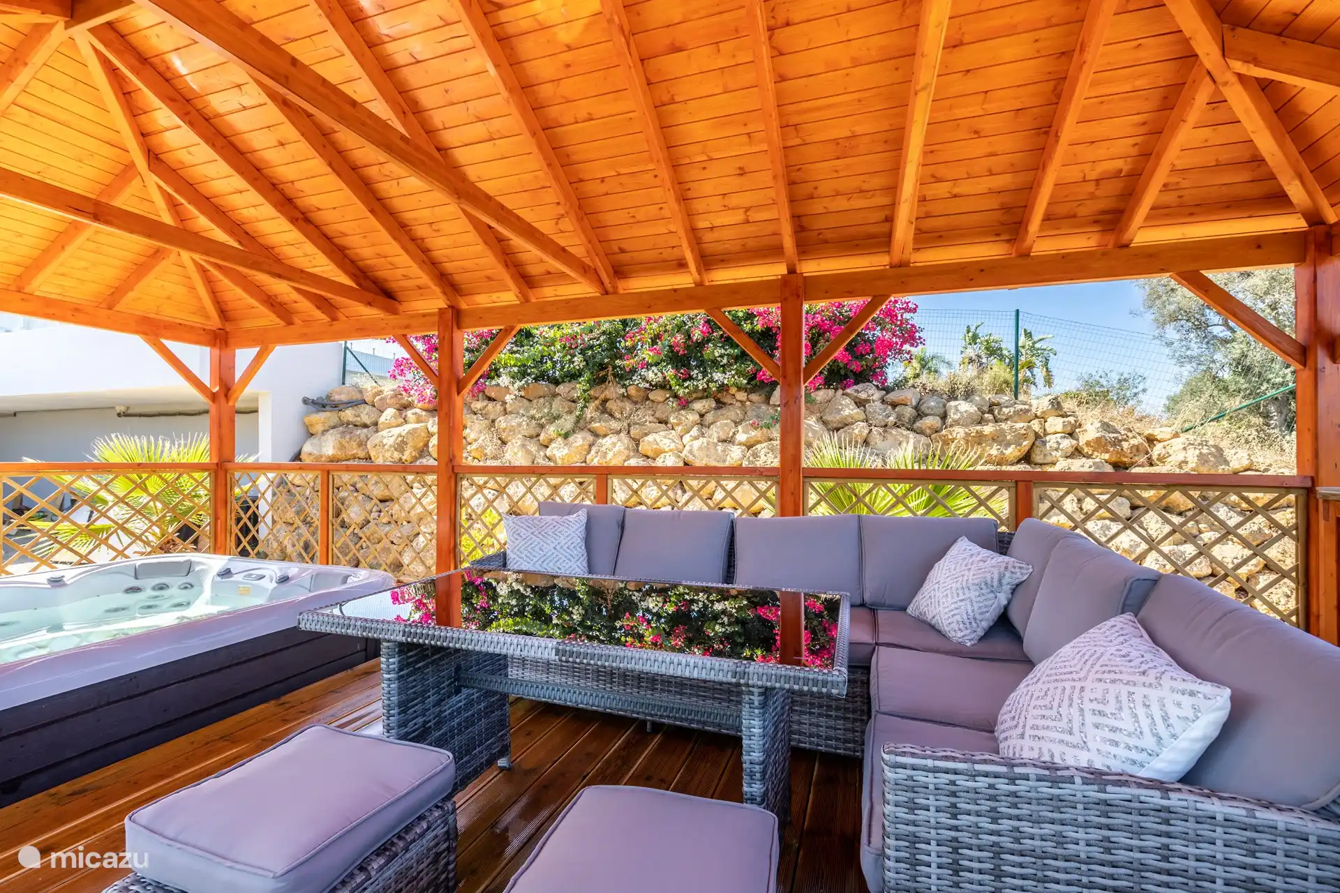 Canopy with lounge set and jacuzzi