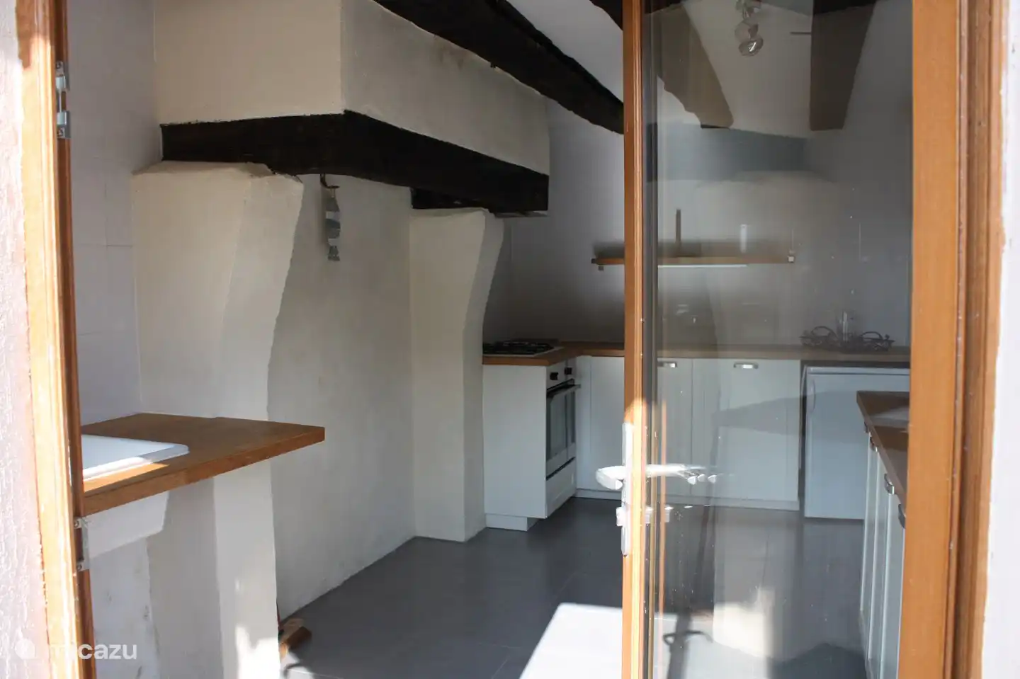 En la cocina se ha conservado la auténtica chimenea.