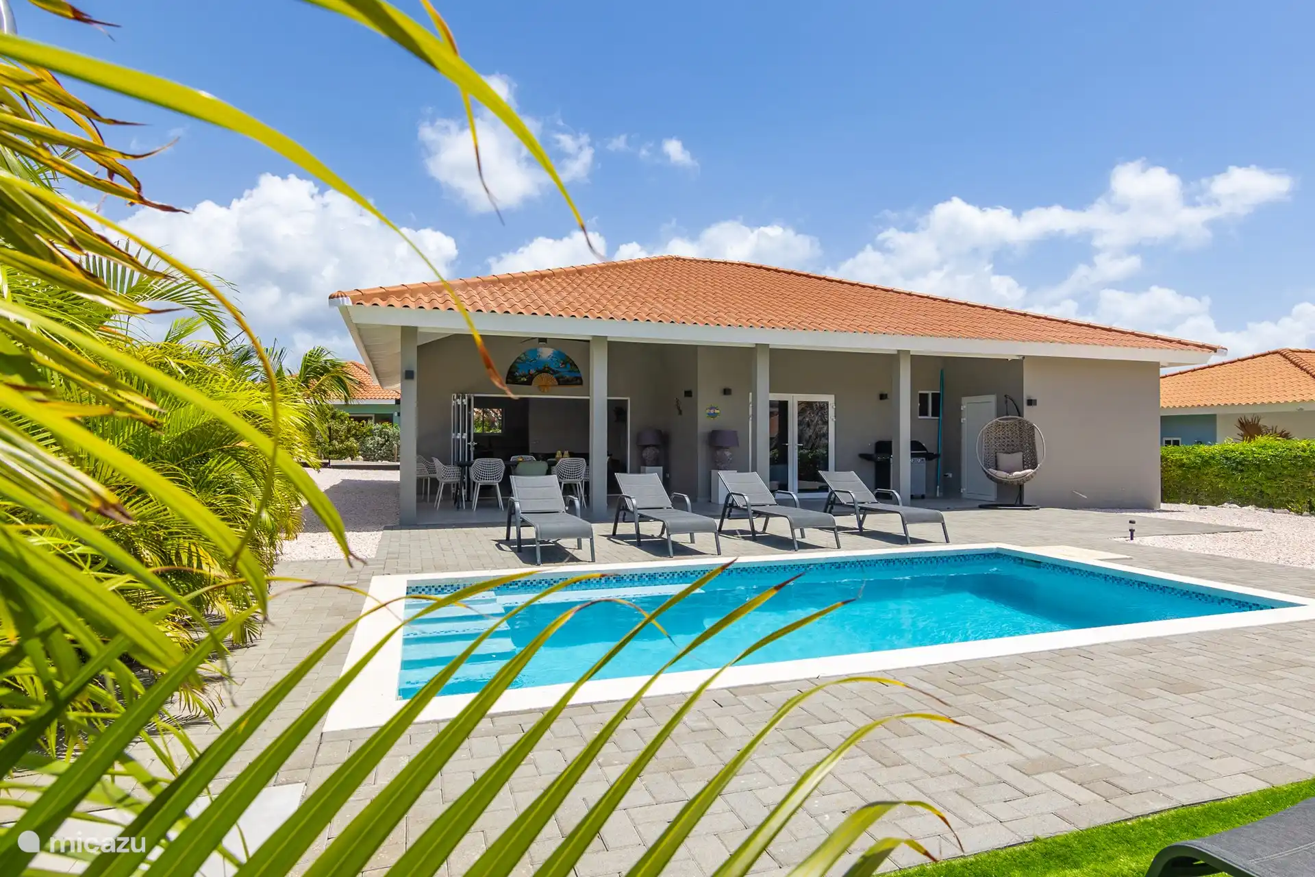 Villa Nisa - view pool towards the porch and the villa