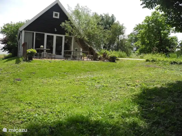 la casa de la sal en Países Bajos, Holanda Meridional, Nieuwveen - chalet Un oasis verde en el verano