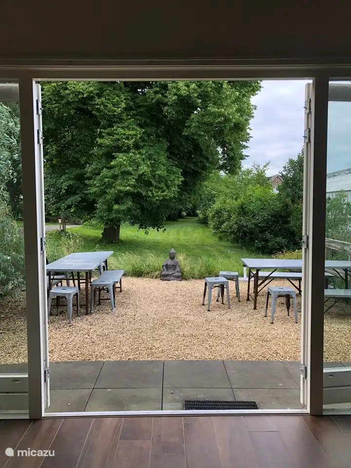 French doors to terrace with green view
