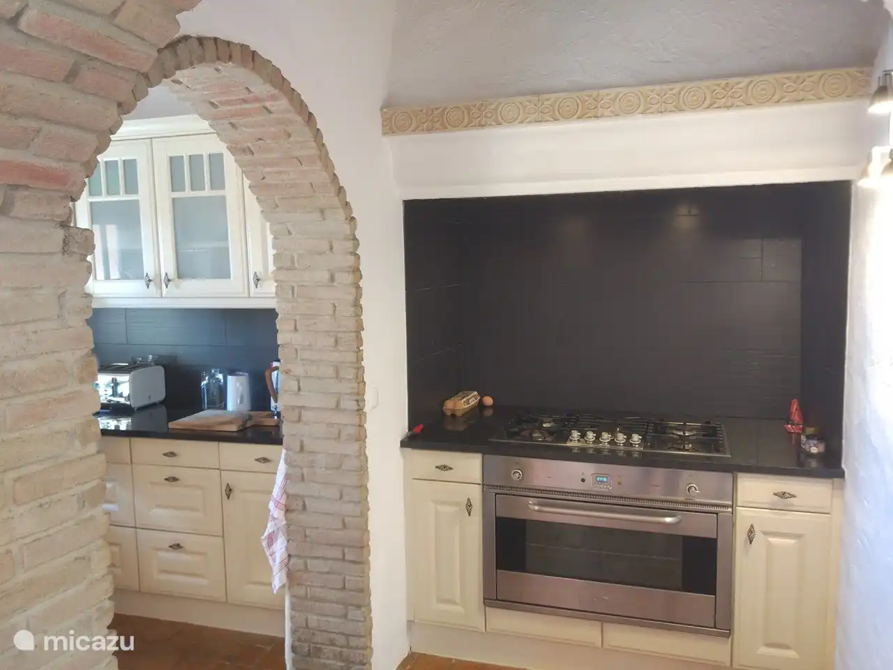 Horno Boretti y cocina a gas de 5 fuegos