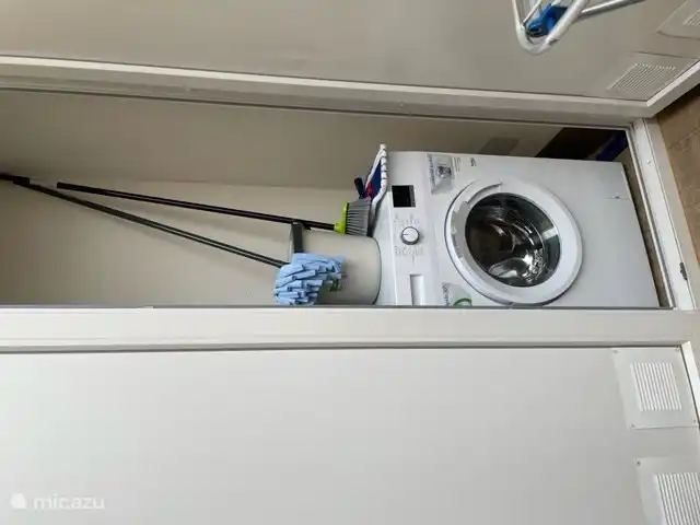 wasmachine staat in de Patio