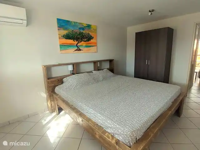 appartement huren in Aruba, Noord, Tanki Leendert – Casita Tortuga Het unieke schilderij werd gemaakt door een lokale artiest. Het is een afbeelding van één van de toeristische trekpleisters van het eiland.