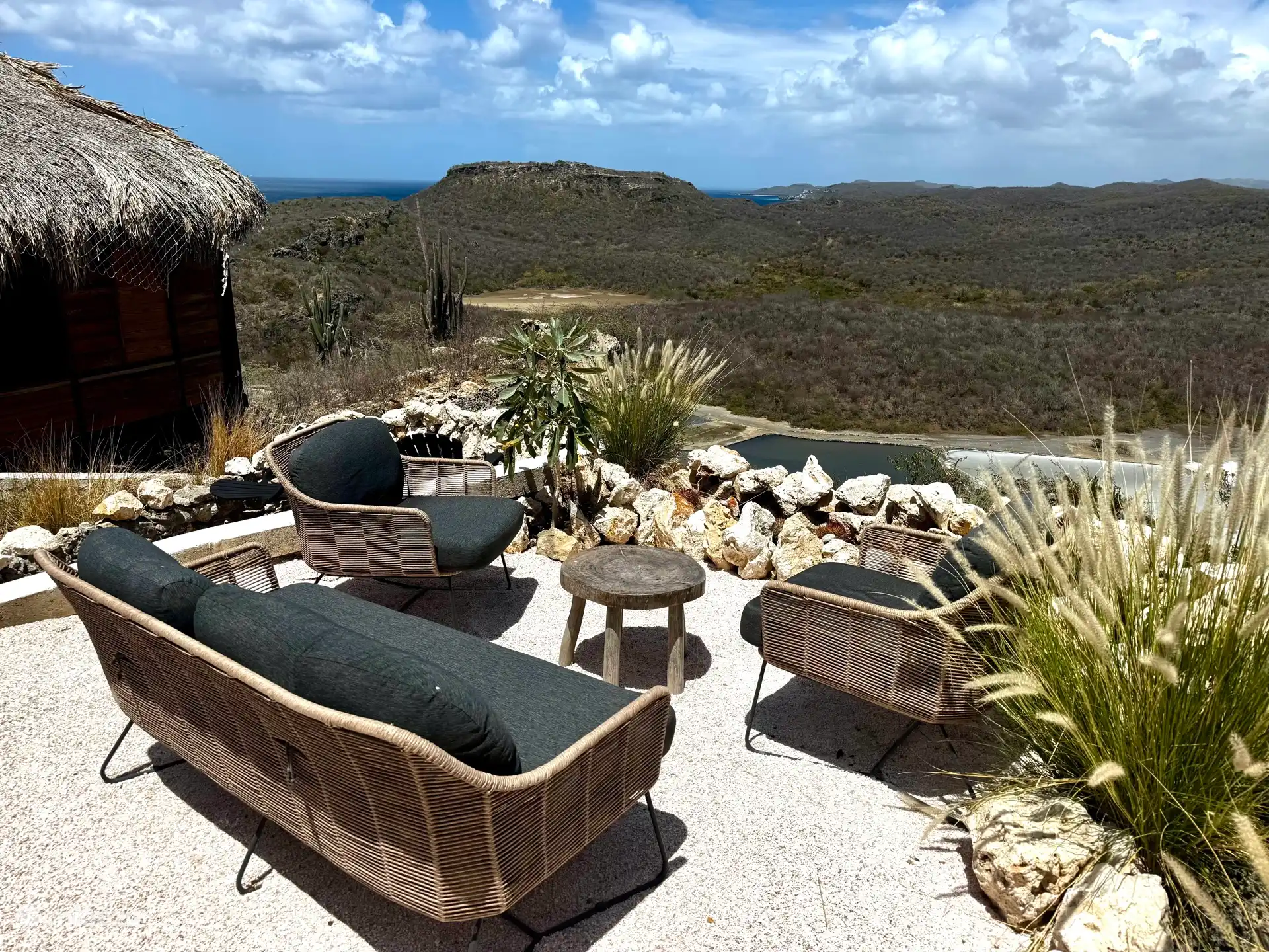 Terrace with a view of the green hills of Bandabou, the sea and the salt marshes with Flamingos