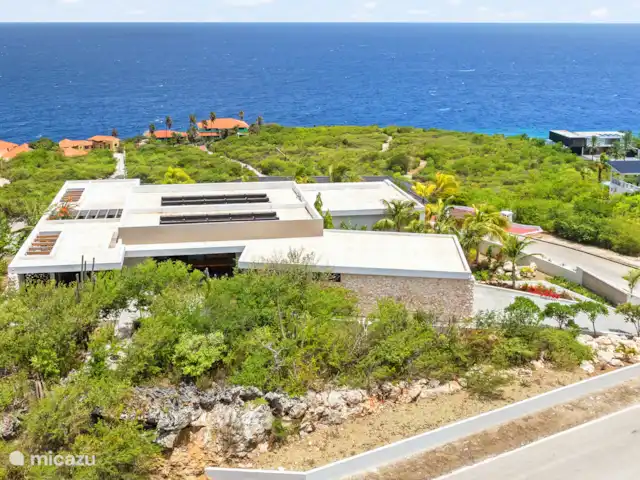 Le curaçao perle bleue | Curaçao, Banda Abou (ouest), Coral Estate, Rif St.Marie - villa Photo aérienne - elle montre clairement la vue large sur la mer.