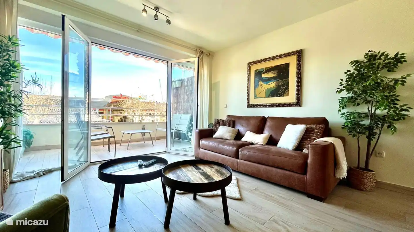 French doors to terrace and impression of the living room