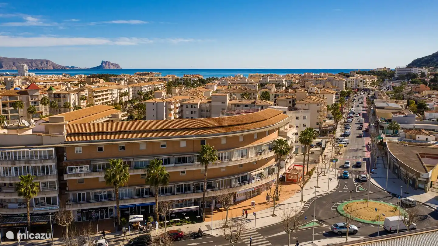 photo of the front of the building, on the right is the apartment on the 1st and 2nd floor, and below you can find nice restaurants / shops etc.