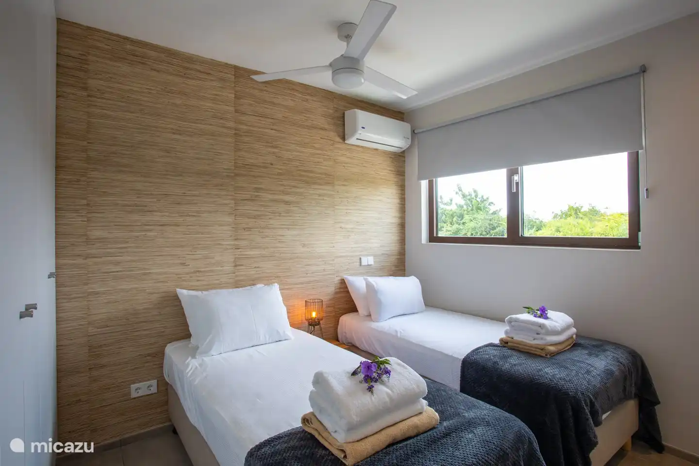 Gasten slaapkamer met a/c en prive badkamer