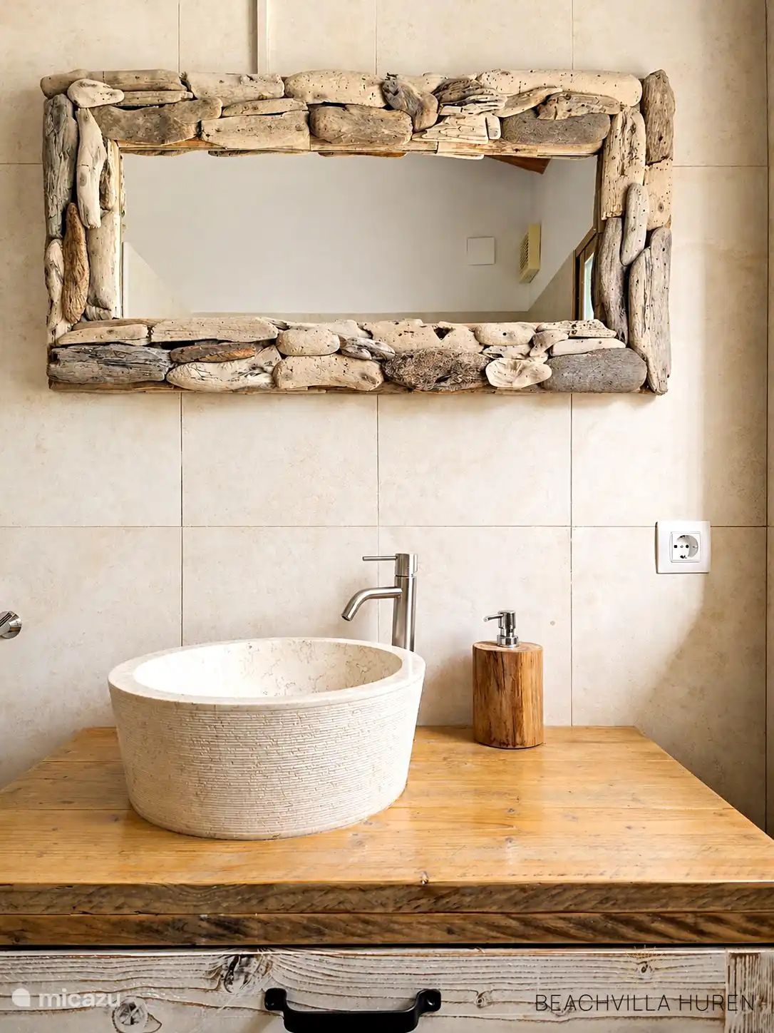 Natural stone washbasin with driftwood mirror