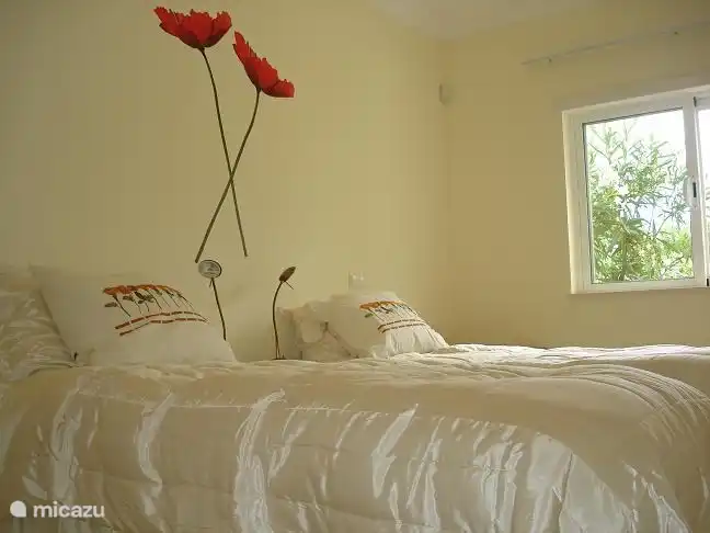 Slaapkamer met 2 bedden welke ook samengevoegd kunnen worden.