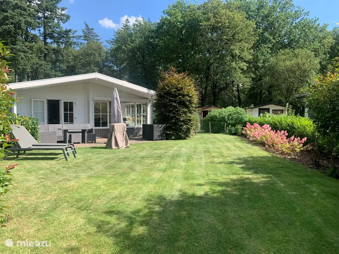 The spacious garden with lots of privacy, at the back right is the log cabin for the bicycles