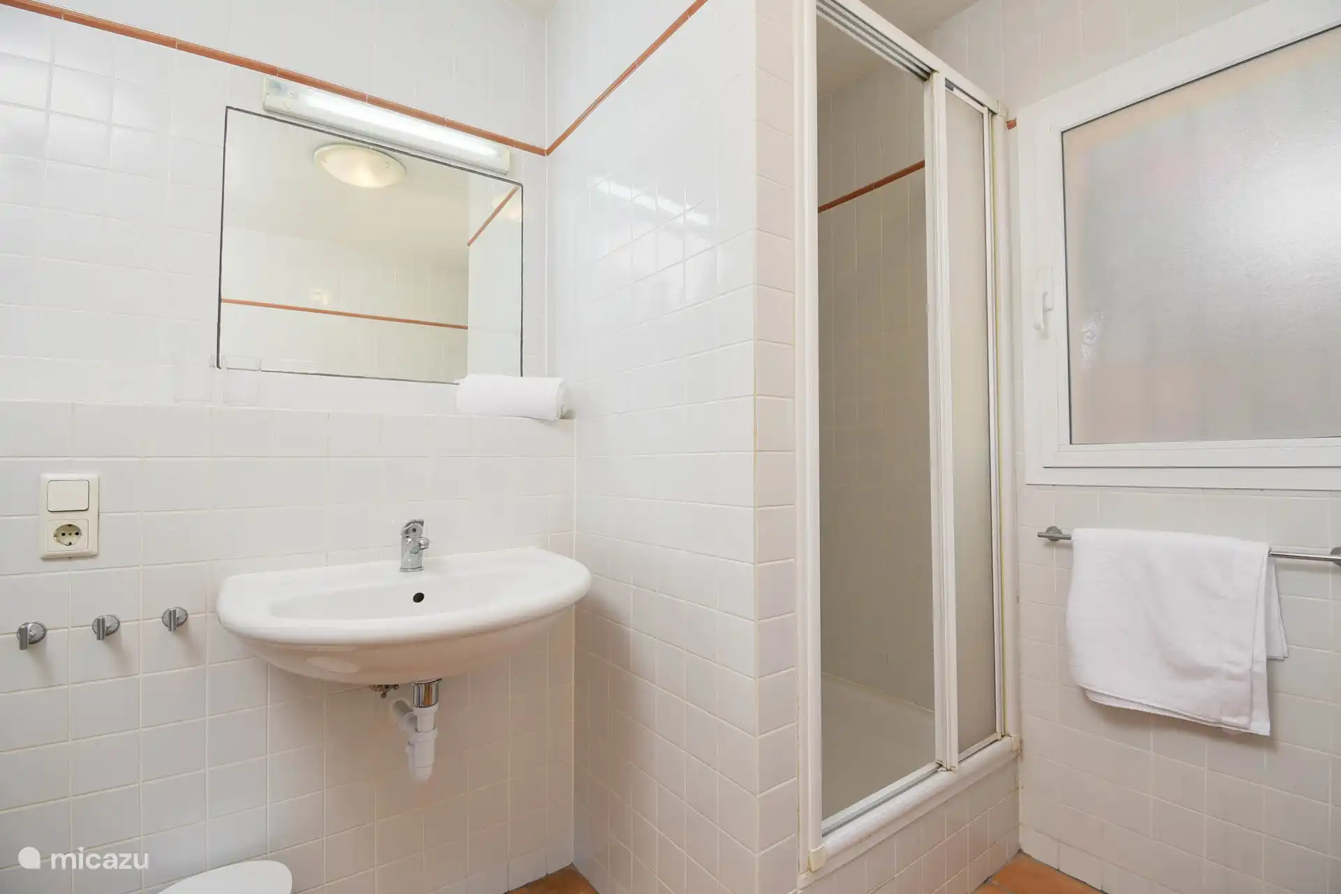 badkamer met wasmachine