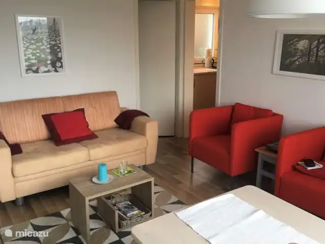 Location de Vacances Allemagne, Sauerland, Husen - Lichtenau, bungalow - Chalet Dalzicht Coin salon avec canapé et 2 fauteuil