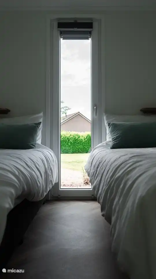 Bedroom 2 with two single beds