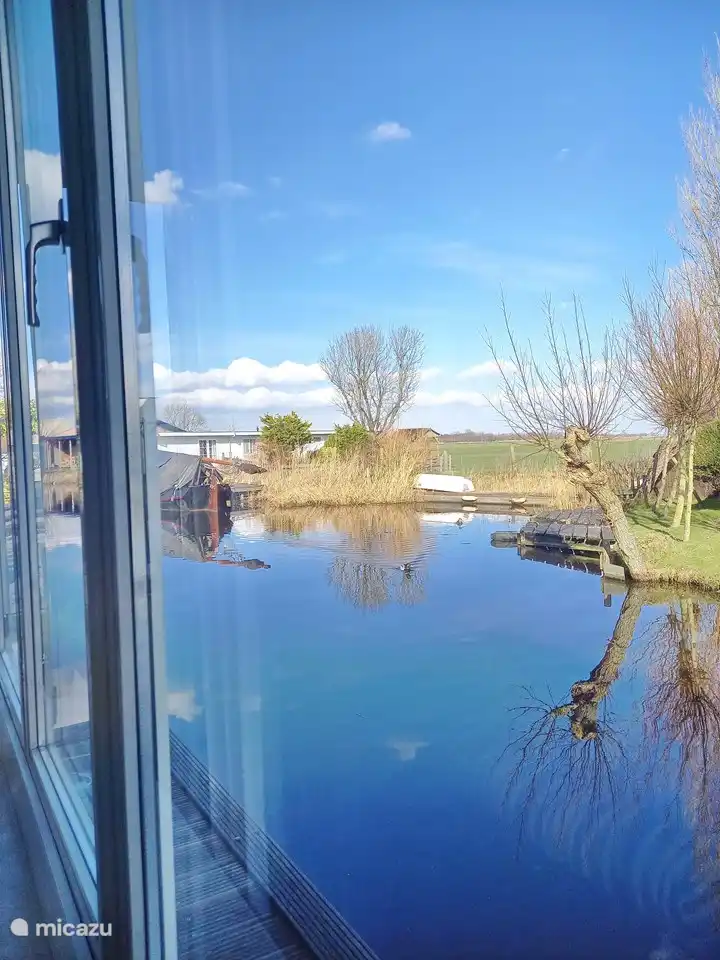 view of the other side of the water... green