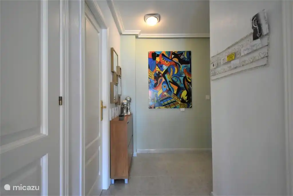 the hall with information board on the right