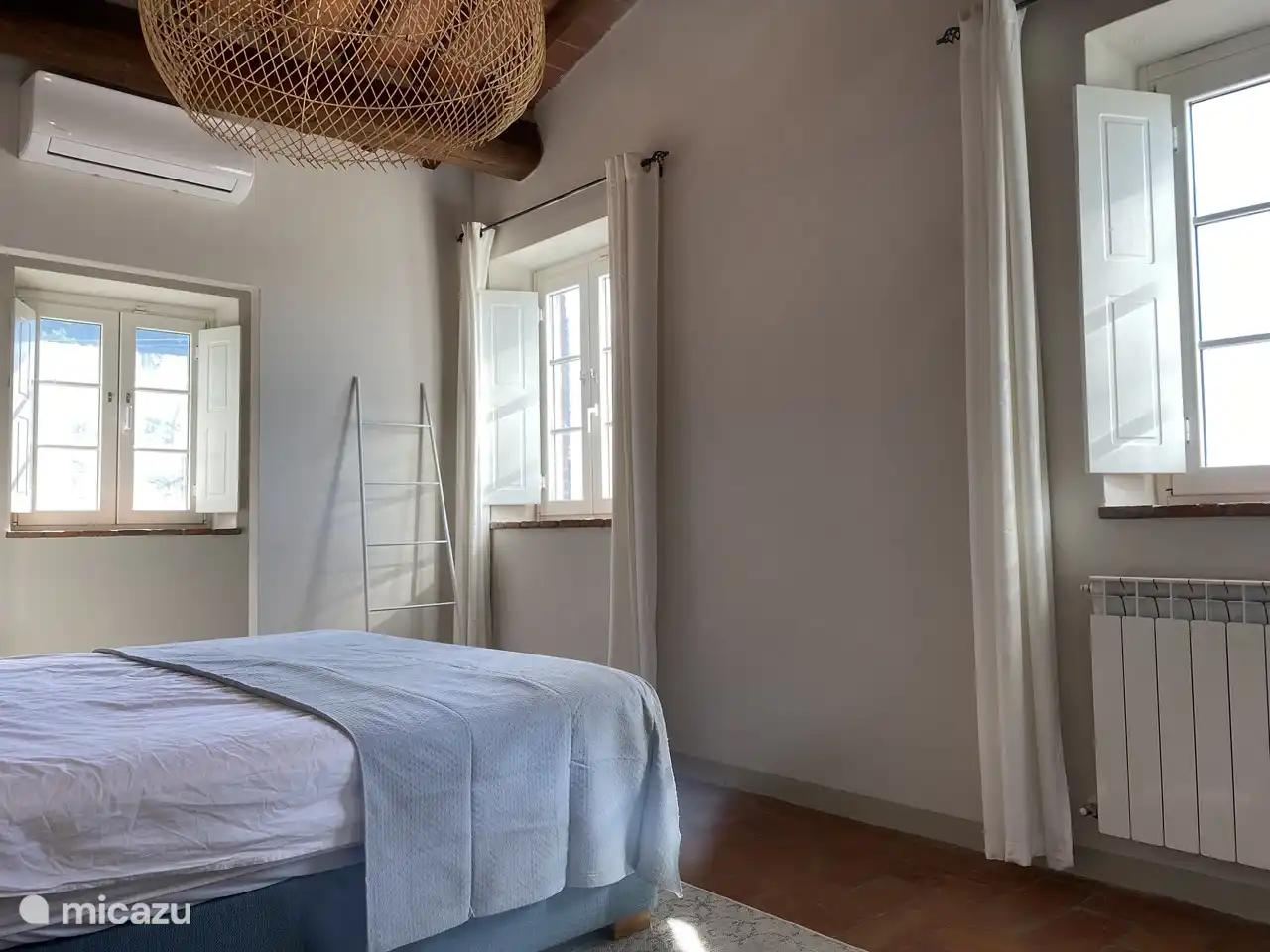 The bedroom with lots of daylight on the first floor.