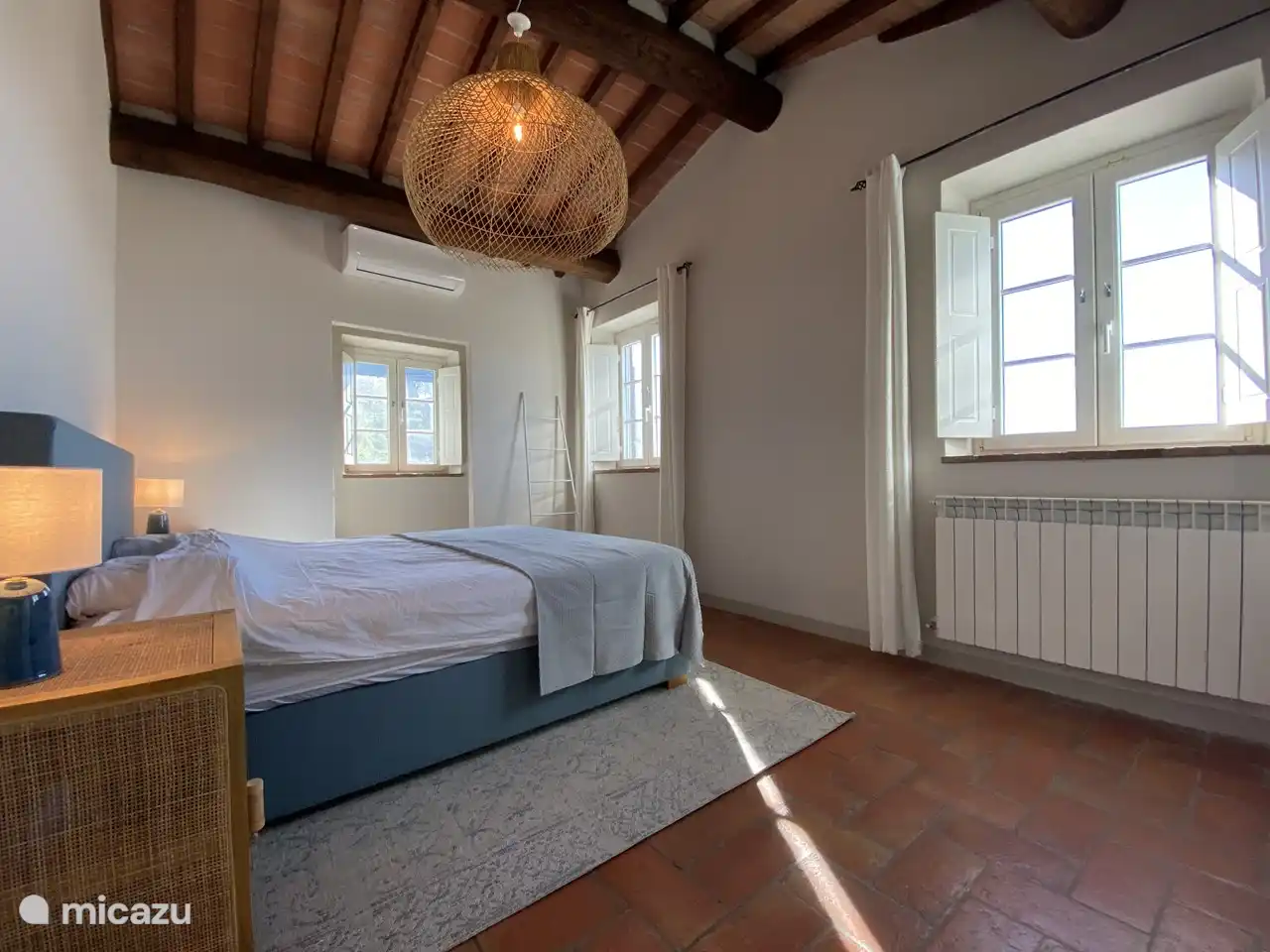 The bed and the room on the first floor