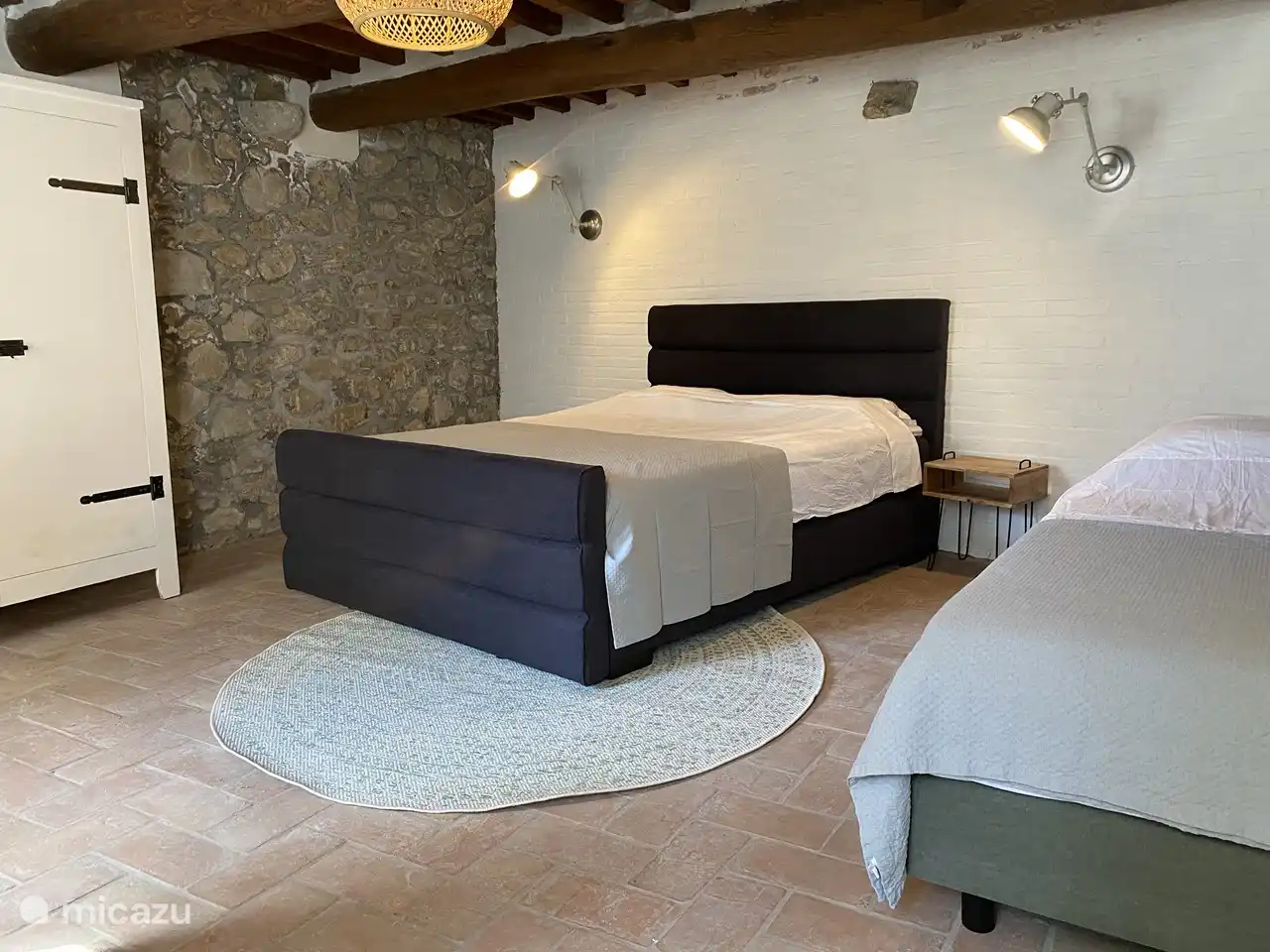 The bedroom on the ground floor for 3 people