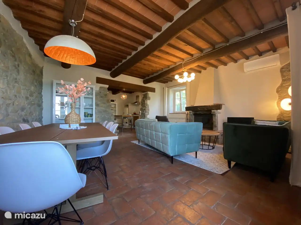 The living room / dining room ( 8 person table )