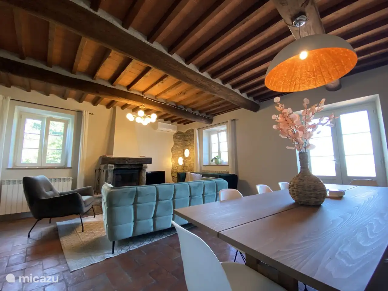 The dining and living room seen from the dining table