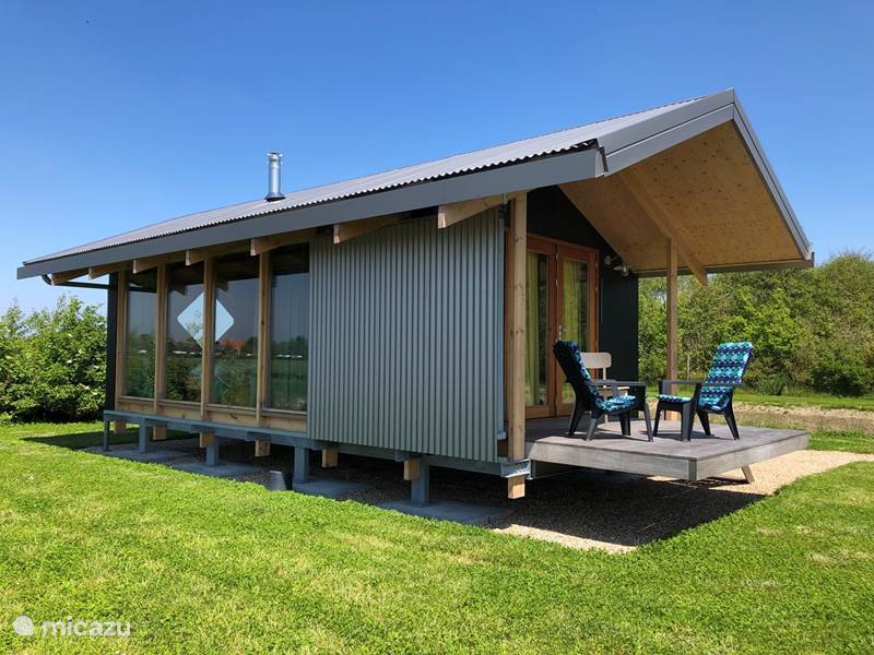 Holiday home in Netherlands, Zeeland, Zonnemaire Tiny house Outdoor room 'grass green'