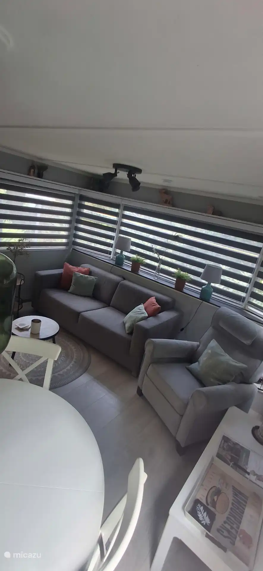 Living room with large sofa and relax chair