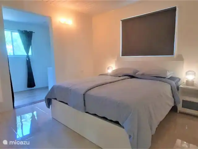 Villa de lujo con hermoso jardín en Aruba, Paradera, Paradera - villa Dormitorio 1 con baño privado y walk in closet
