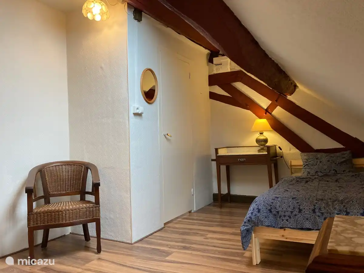 The single bed in the children's bedroom